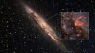This image shows NGC 4945, a spiral galaxy over 12 million light-years away in the constellation of Centaurus; NGC 4945’s supermassive black hole-driven wind is shown in red in the inset. Image credit: ESO / Marconcini et al.