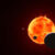 The Earth-size exoplanet TRAPPIST-1e, depicted at the lower right, is silhouetted as it passes in front of its flaring host star in this artist’s concept of the TRAPPIST-1 system. Image credit: NASA / ESA / CSA / STScI / Joseph Olmsted, STScI.