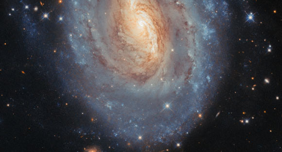 This Hubble image shows NGC 6000, a barred spiral galaxy some 102 million light-years away in the constellation of Scorpius. Image credit: NASA / ESA / Hubble / A. Filippenko / M.H. Özsaraç.