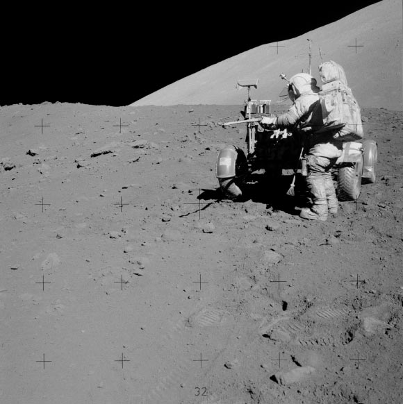 Commander Eugene Cernan retrieves a drive tube from the Lunar Roving Vehicle during an Apollo 17 EVA. Image credit: NASA.