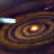 This artist’s impression shows the evolution of heavy water molecules as they have been observed in giant molecular clouds, a planet forming-disk, and comets -- before they eventually may have made their way to Earth. Image credit: NSF / AUI / NSF’s NRAO / P. Vosteen / B. Saxton.