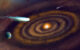 This artist’s impression shows the evolution of heavy water molecules as they have been observed in giant molecular clouds, a planet forming-disk, and comets -- before they eventually may have made their way to Earth. Image credit: NSF / AUI / NSF’s NRAO / P. Vosteen / B. Saxton.