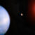 An artist’s conception of the Gliese 251 system, showing Gliese 251c (left), its host star (right), and the previously-discovered planet Gliese 251b (middle). Image credit: Michael Marcheschi / m2design.