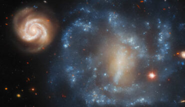This Hubble image shows the galaxy pair Arp 4. Image credit: NASA / ESA / Hubble / J. Dalcanton, Dark Energy Survey / DOE / FNAL / DECam / CTIO / NOIRLab / NSF / AURA.