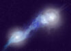 An artist’s impression of a rare trio of merging galaxies, J121/1219+1035, which host three actively feeding, radio-bright supermassive black holes and whose jets light up the surrounding gas. Image credit: NSF / AUI / NRAO / P. Vosteen.