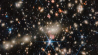 This Webb image shows the galaxy cluster MACS J1149.5+2223. Image credit: NASA / ESA / CSA / Webb / C. Willott, National Research Council Canada / R. Tripodi, INAF-Astronomical Observatory of Rome.