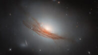 This Hubble image shows NGC 7722, a lenticular galaxy some 187 million light-years away in the constellation of Pegasus. Image credit: NASA / ESA / Hubble / R.J. Foley, UC Santa Cruz / Dark Energy Survey / DOE / FNAL / DECam / CTIO / NOIRLab / NSF / AURA / Mehmet Yüksek.