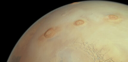 This perspective view from ESA’s Mars Express shows three of Mars’ famously colossal volcanoes (from left to right): Arsia, Pavonis and Ascraeus Mons. Image credit: ESA / DLR / FU Berlin.