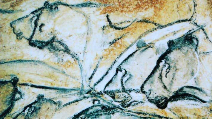 Cave lions painted in the Chauvet Cave, France.