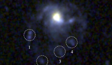 This Webb image shows the jellyfish galaxy COSMOS2020-635829; the dashed circles mark the four extraplanar sources that are identified in the tail of the galaxy. Image credit: Roberts et al., doi: 10.3847/1538-4357/ae3824.