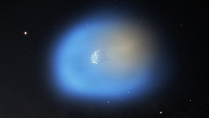 An artist’s impression of 3I/ATLAS is shown as it passes near the Sun, illuminating one side of the comet; on the side of the comet closer to the Sun, the methanol gas is shown in blue, with icy dust grains still present in the gas; on the dark side of the comet, the hydrogen cyanide is shown in orange. Image credit: NSF / AUI / NRAO / M.Weiss.