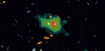 An enormous halo of hydrogen gas found in HETDEX data and superimposed over its location as seen in deep imaging from the NASA/ESA/CSA James Webb Space Telescope; present 11.3 billion years ago, this system glows from the combined light of many galaxies within it, with the brightest region represented in red. Image credit: Erin Mentuch Cooper, HETDEX / NASA / ESA / CSA / STScI.
