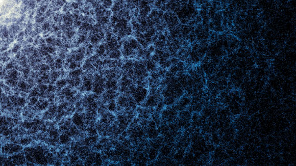 A small portion of DESI’s year-five map in which the large-scale structure of the Universe, created by gravity, is visible; each dot represents a galaxy; the denser areas indicate regions where galaxies and galaxy clusters have clumped together to form the strands of the cosmic web; also seen are large voids between the filaments. Image credit: DESI Collaboration / DESI Member Institutions / DOE / KPNO / NOIRLab / NSF / AURA / R. Proctor / M. Zamani, NSF’s NOIRLab.