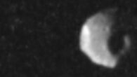 Juno captured this view of Thebe during a close flyby on May 1, 2026. Image credit: NASA / JPL-Caltech.