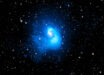 This composite image combines both the original X-ray and the subtracted X-ray images of the deep Chandra observations of Abell 2029. Image credit: NASA / CXC / CfA / Watson et al. / PanSTARRS / SAO / N. Wolk / P. Edmonds.