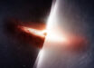 Radio signal from the quasar TXS 2005+403 travels roughly 10 billion light-years to reach Earth, traversing the Cygnus region, one of the most turbulent and scattering environments in the Milky Way Galaxy. On the left, this artist’s conception shows the quasar as it truly appears, with a bright accretion disk and jets blasting into the Galaxy like a beacon through the darkness. On the right, we see how turbulent gas distorts scientists’ view of the quasar in much the same way heat haze from a fire warps our view of the objects behind it. Image credit: Melissa Weiss / CfA.