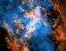 This image shows the evidence for the wind blowing away from Sagittarius A*: the white dot in the center of the image shows the supermassive black hole; in orange is data from ALMA, mapping the location of cold gas composed of carbon monoxide in the image; in blue is X-ray data from Chandra; a large cone-shaped cavity, visible as an absence of cold gas in the ALMA data, is filled by hot X-ray-emitting gas in the Chandra data. Image credit: NASA / CXC / UMass / Wang et al. / ALMA / ESO / NAOJ / NRAO / Longmore et al. / Minniti et al.