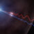 This illustration depicts Faraday rotation in the afterglow of a gamma-ray burst. A powerful jet (upper left) sends polarized radio waves outward through the thin wall of a surrounding bubble of magnetized gas called an HII region. As the light passes through this material, its polarization angle is twisted by the magnetic field. Because the effect is stronger at longer wavelengths, the red and blue waves, which represent different radio wavelengths, exit the bubble oscillating in different directions. By measuring this difference, astronomers were able to map the magnetic environment surrounding GRB 260310A for the first time. Image credit: NSF / AUI / NRAO / M. Weiss