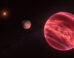 This illustration shows the stellar system CD-35 2722, with the newly found exomoon at the center; the star has about half the mass of our Sun, and it is orbited by a brown dwarf, the reddish-brown object seen here in the foreground (right). Image credit: ESO / M. Kornmesser.
