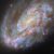 This Hubble image shows NGC 4654, an intermediate spiral galaxy some 55 million light-years away in the constellation of Virgo. Image credit: NASA / ESA / Hubble / D. Thilker / J. Lee / PHANGS-HST Team.
