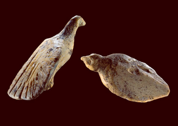 Two bird figurines found at Hohle Fels Cave in Germany. Image credit: Ralf Ehmann / University of Tübingen / Museum of Prehistory and Ice Age Art.