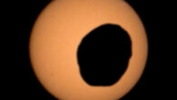 This image of Phobos in front of the Sun was captured by Perseverance’s Mastcam-Z camera on August 12, 2026. Image credit: NASA / JPL-Caltech / ASU / MSSS / SSI.