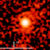 Little red dots may reside in small galaxies with total masses equivalent to around one billion times that of the Sun. Image credit: Zhang et al., doi: 10.1038/s41550-026-02945-z.