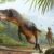 While some dinosaurs are thought to have had ‘fuzzy’ or ‘downy’ feathers (shown in this illustration as the yellow spikes on a Nanotyrannus’ neck), ancient birds (such as the one in the Nanotyrannus’ mouth) were more likely to have had feathers that look similar to the birds of today. Image credit: Andrey Atuchin.