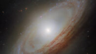 This Hubble image shows NGC 4698, a barred spiral galaxy some 55 million light-years away in the constellation of Virgo. Image credit: NASA / ESA / Hubble / D. Thilker, MAUVE-HST Team.