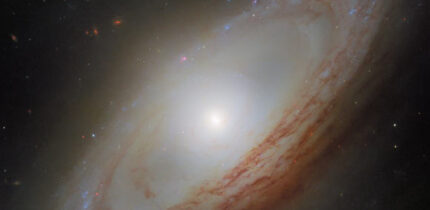 This Hubble image shows NGC 4698, a barred spiral galaxy some 55 million light-years away in the constellation of Virgo. Image credit: NASA / ESA / Hubble / D. Thilker, MAUVE-HST Team.