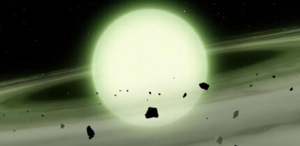 The cool white dwarf WD J1330+6435 has accreted sodium-rich rocky material from its planetary system into its atmosphere; the immense atmospheric density causes the sodium to absorb light over broad range of yellow, orange, and red wavelengths, giving the WD J1330+6435 a ghostly green appearance. Image credit: Mark A. Garlick / University of Warwick.
