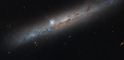 This Hubble image shows the edge-on, intermediate spiral galaxy NGC 1827. Image credit: NASA / ESA / Michael Jones, California Institute of Technology / Gladys Kober, NASA / Catholic University of America.