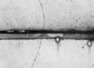 Cloud chamber photograph by the American experimental physicist Carl David Anderson of the first positron ever identified.