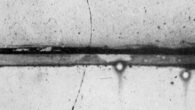 Cloud chamber photograph by the American experimental physicist Carl David Anderson of the first positron ever identified.