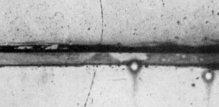 Cloud chamber photograph by the American experimental physicist Carl David Anderson of the first positron ever identified.